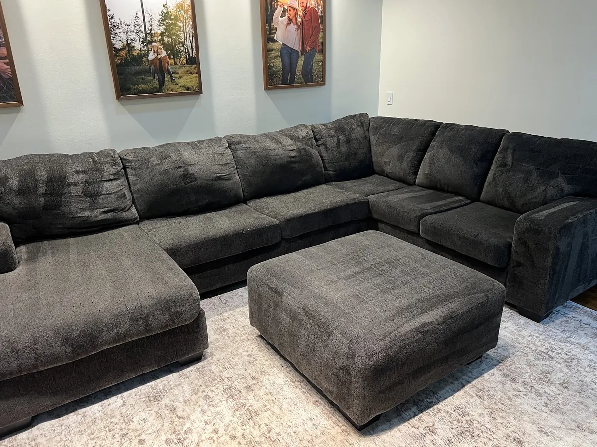 Dark gray sectional sofa after upholstery cleaning