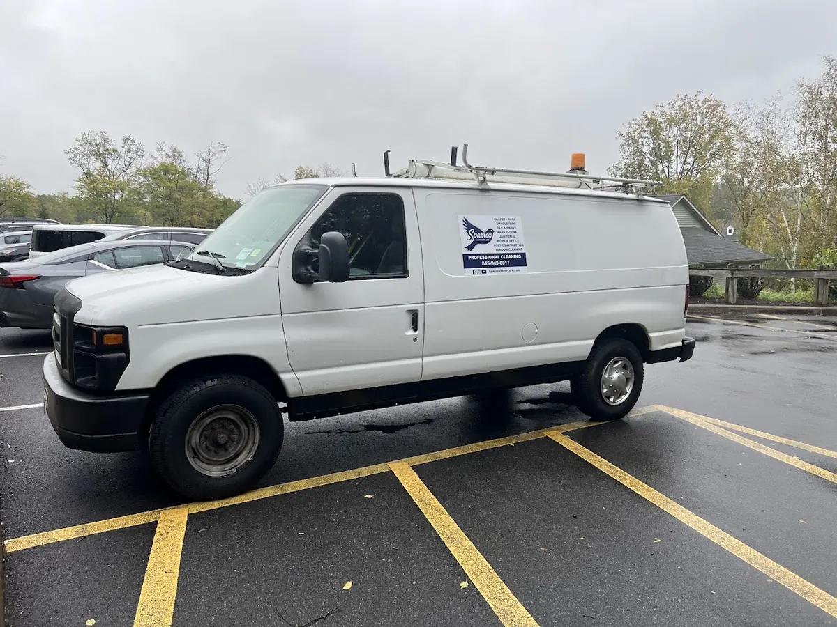 Sparrow Floor Care van parked at a customer site